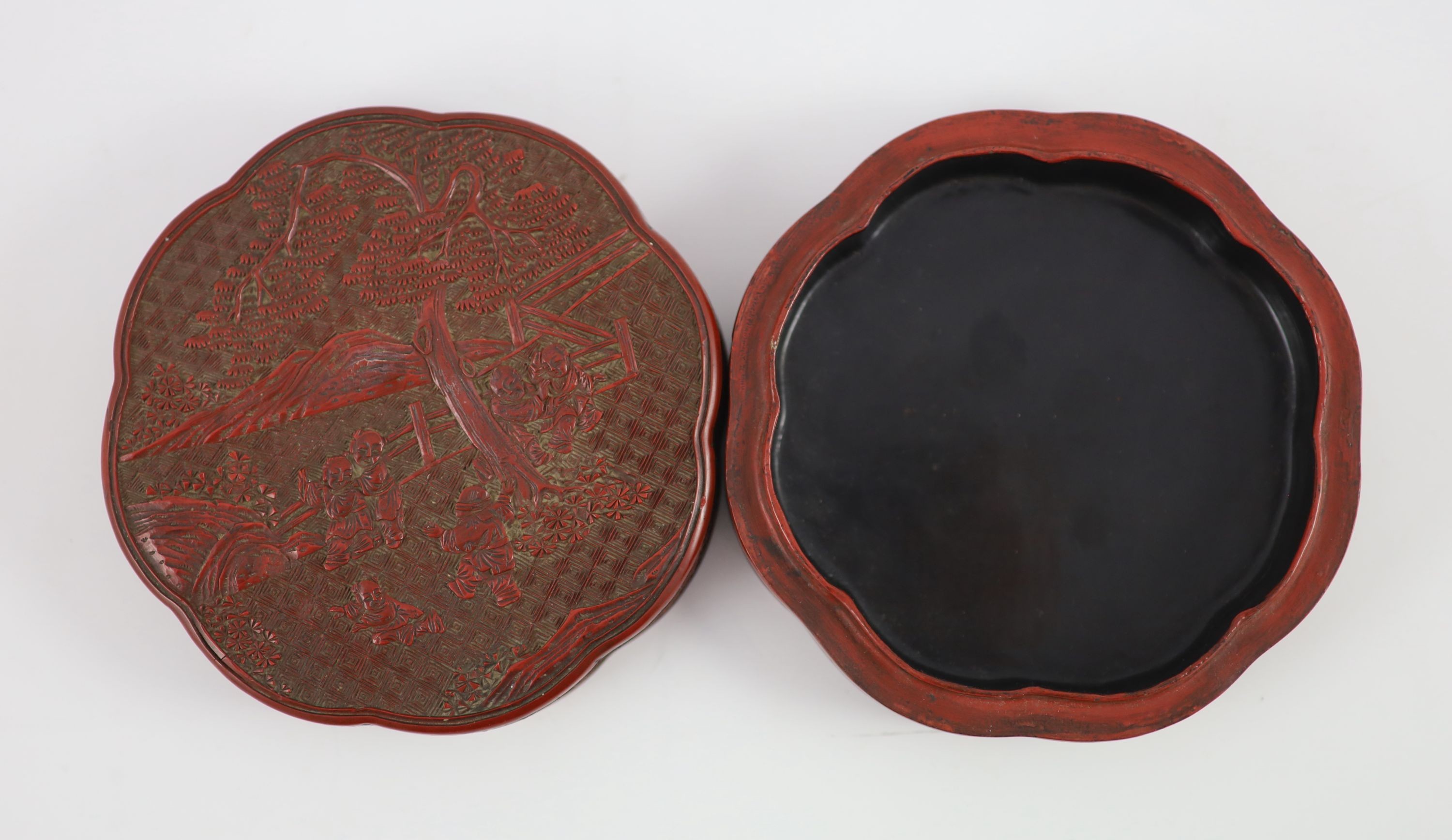 A Chinese cinnabar lacquer ‘boys’ box and cover, 19th century 13.5 cm diameter